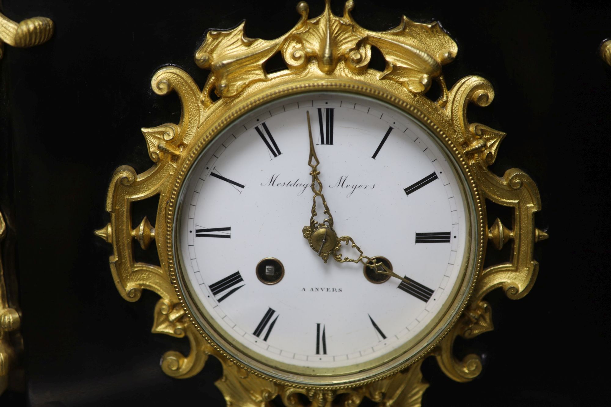 A late 19th century French ebonised and ormolu mounted mantel clock, height 33cm